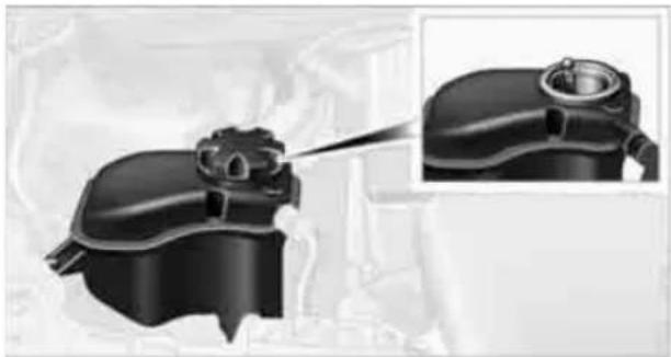 Close-up of a mechanical component with a magnified inset showing internal structure (no visible text or symbols)