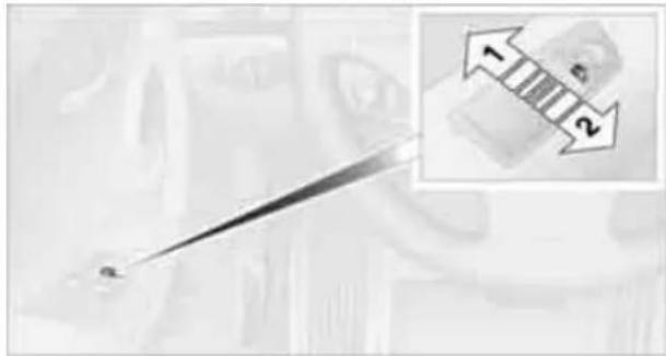 Close-up of a thermometer with an inset showing two directional arrows labeled 1 and 2 (no text or symbols on the thermometer itself)