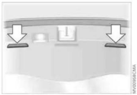 Diagram showing two downward arrows pointing to a central object, with no readable text or symbols.