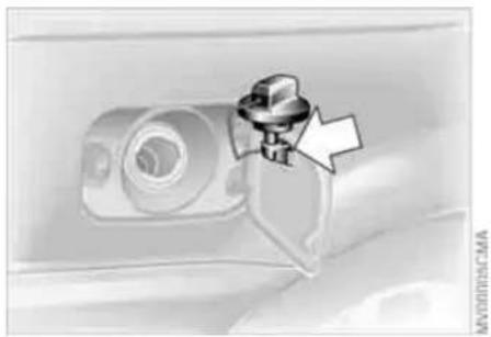 Close-up of a mechanical component with a knob and arrow indicator (no text or symbols)