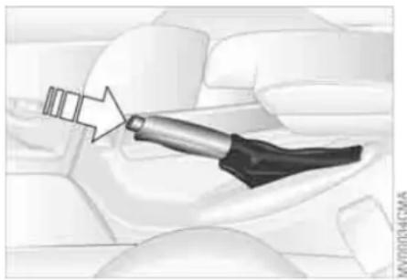 Illustration of a mechanical component with a star-shaped arrow pointing to it, set against a textured background (no text or symbols)