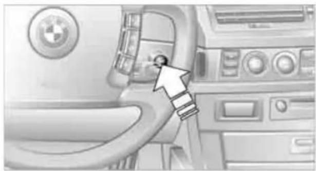 Interior view of a car dashboard with steering wheel and passenger seat (no visible text or symbols)