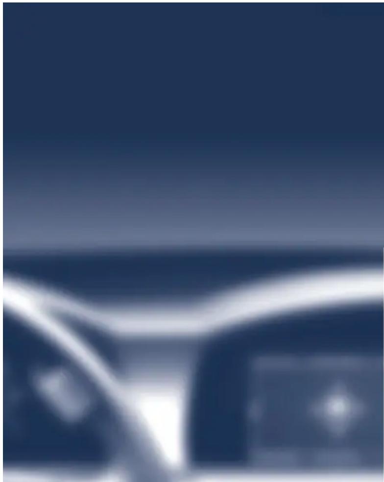 Blurred abstract image with dark blue background and white curved lines, no discernible text or symbols