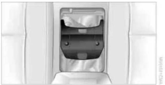 Top-down view of a white plastic bag with internal compartments and mounting holes (no text or symbols visible)