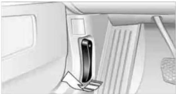 Interior view of a vehicle showing a door, seatbelt, and exhaust pipe (no text or symbols visible)
