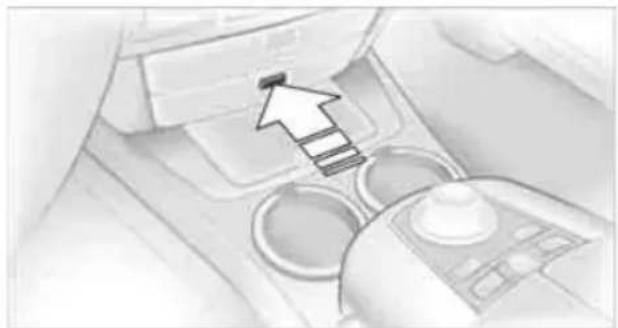 Interior view of a car dashboard with a hand cursor pointing to the dashboard area (no visible text or symbols)