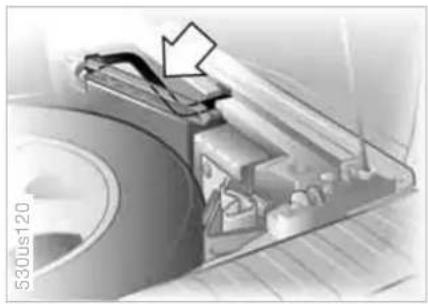 Close-up of a mechanical component with a highlighted section and arrow, no visible text or symbols