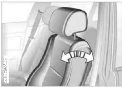 Interior view of a car seat with a curved arrow indicating rotation or movement (no text or symbols)