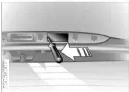 Close-up of a mechanical component with an arrow pointing to a section, no visible text or symbols