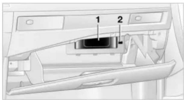Diagram of a device interior with labeled parts 1 and 2, showing internal components and directional arrows.