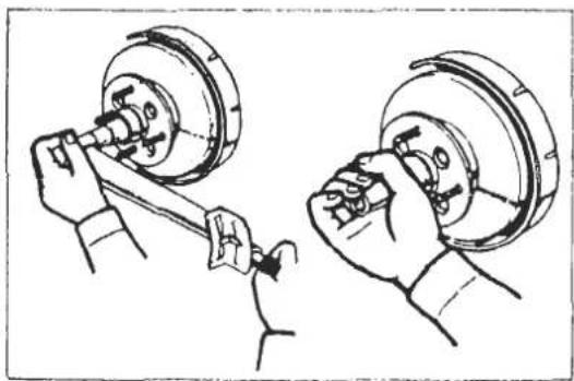 Technical line drawing showing two hands performing mechanical assembly (no text or symbols)