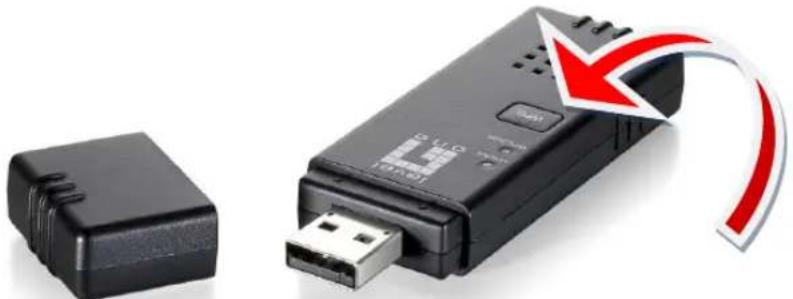 Black USB device with USB port and a small black connector, accompanied by a red arrow graphic (no text or symbols)