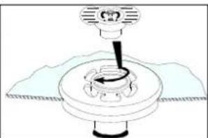 Diagram of a mechanical device with a central shaft and base, no visible text or symbols