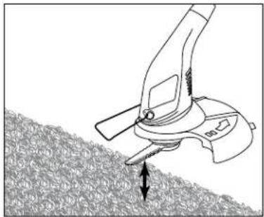 Line drawing of a hand using a power tool to lift a textured surface, with no visible text or symbols.