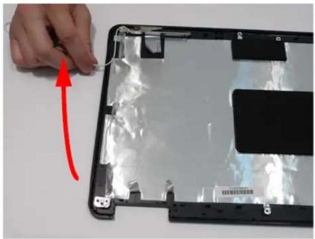 Close-up of a hand holding a plastic-wrapped electronic device with a red arrow pointing to the part (no text or symbols visible).