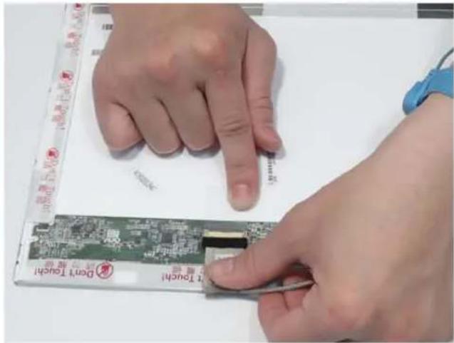 Close-up of hands installing a card on a device with visible 'Don't Touch' and '1 Touch' labels
