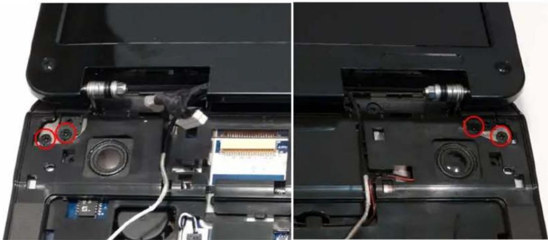 Close-up of a device showing internal components and wiring, with red circles highlighting specific parts (no text or symbols visible)