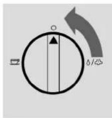 Diagram showing a circular dial with directional arrows and a symbol indicating rotation or change.