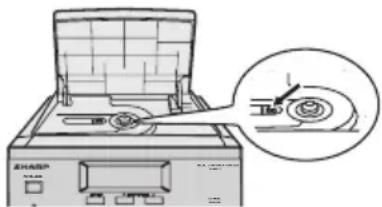 Diagram of a machine with a fan blade and a magnified inset showing a circular component (no text or symbols)