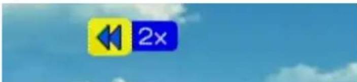 Image showing a yellow play button with left and right buttons next to the text '2x' against a blue sky background.