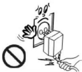Safety warning illustration showing a hand using a power tool to stop a device with a 'No' symbol below.