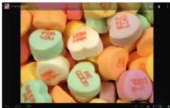 Close-up of colorful, round, round-shaped objects with visible logos (no readable text or symbols)