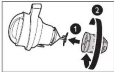 Diagram showing mechanical assembly with labeled parts 1 and 2, likely illustrating a turning or disassembly process.