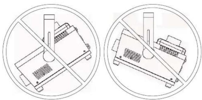 Two circular diagrams showing a device with a diagonal line crossing through it, no text or symbols present.