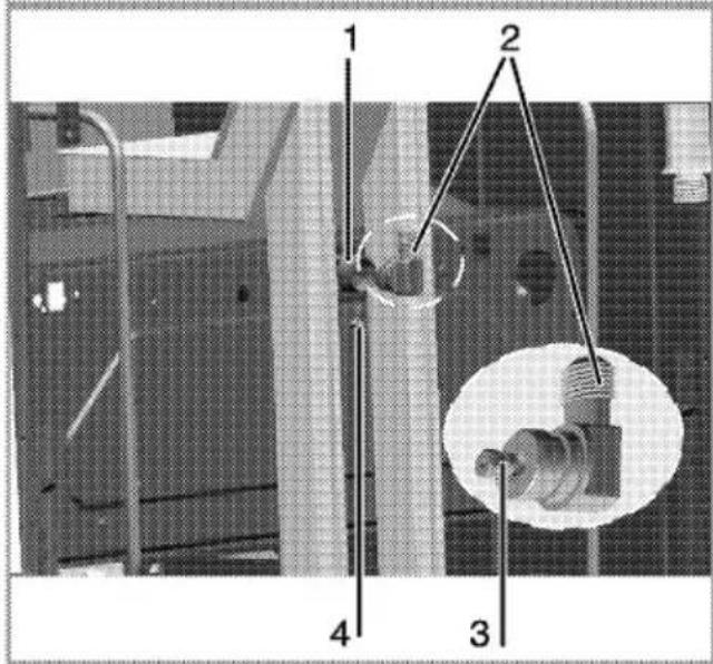 Technical diagram showing labeled components of a mechanical assembly with numbered parts and an inset magnified view.