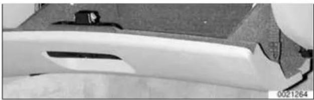 Close-up of a car's side panel showing the front wheel and side cover (no text or symbols visible)