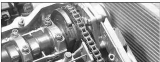 Close-up of mechanical components including gears and springs (no visible text or symbols)