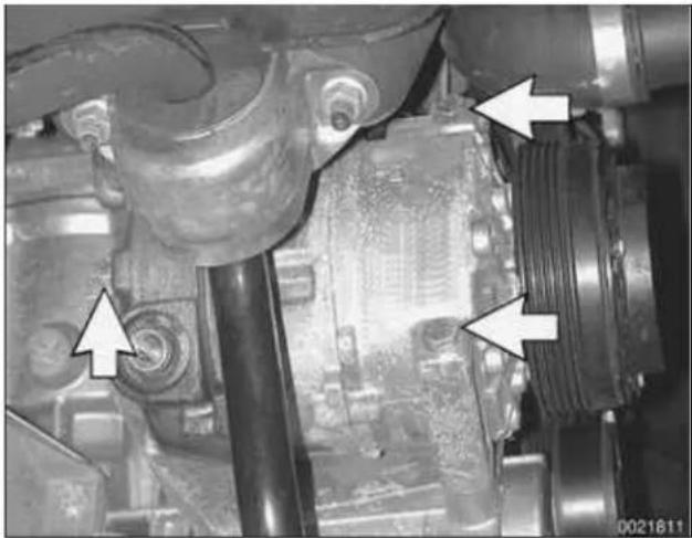 Close-up of mechanical components with arrows pointing to features, no visible text or symbols.