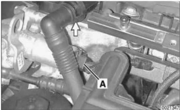 Close-up of an engine cylinder assembly with labeled component A (no readable text or symbols beyond labels)