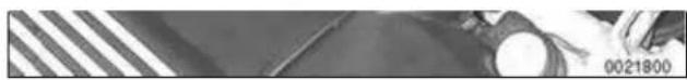 Close-up of a mechanical component with striped pattern and circular features (no visible text or symbols)