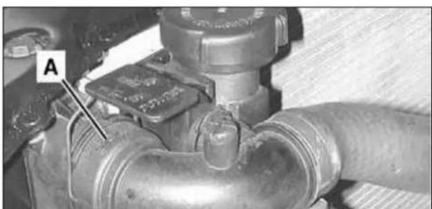 Close-up of a mechanical pipe fitting with a labeled component 'A' (no readable text or symbols beyond label)