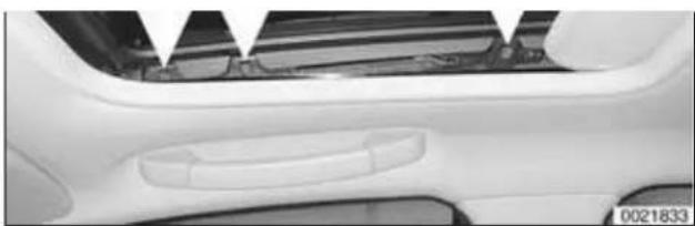Close-up of a car's side panel showing the front and rear door (no text or symbols visible).