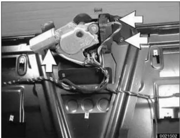 Close-up of a mechanical assembly with visible wiring and components, no readable text or symbols present.