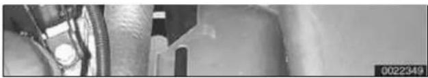 Close-up of industrial piping and valves in a mechanical assembly (no visible text or symbols)