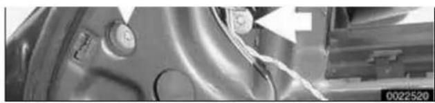 Close-up of a metallic mechanical component with visible springs and adjustment knobs (no text or symbols)