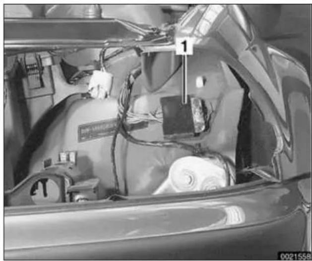 Interior view of a car showing internal components and wiring (no visible text or symbols)
