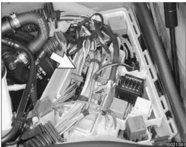 Interior view of an electrical enclosure with bundled cables and connectors (no visible text or symbols)