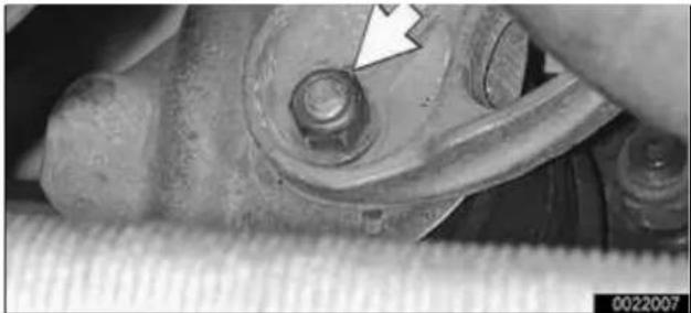 Close-up of mechanical components with a bolt and threaded shaft, no visible text or symbols