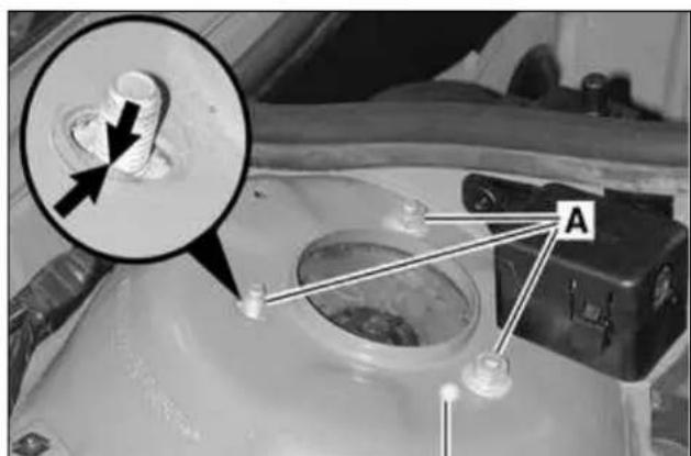 Medical or laboratory image showing a device with labeled component 'A' and an inset magnified view of a circular feature.