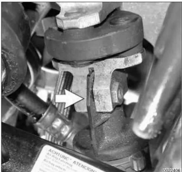 Close-up mechanical assembly showing a valve and shaft component with no visible text or symbols