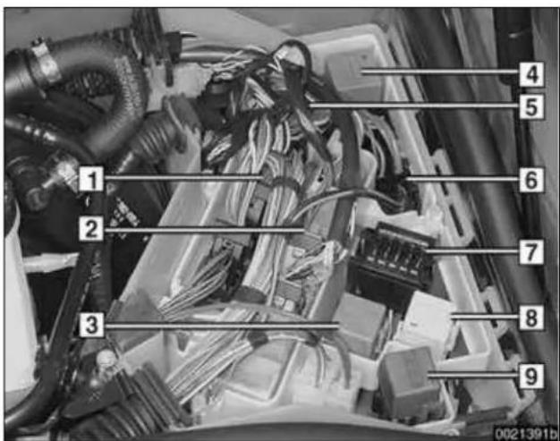 Labeled diagram of a car engine bay with numbered components for identification