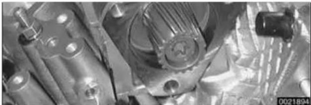 Close-up of mechanical components including gears and shafts (no visible text or symbols)