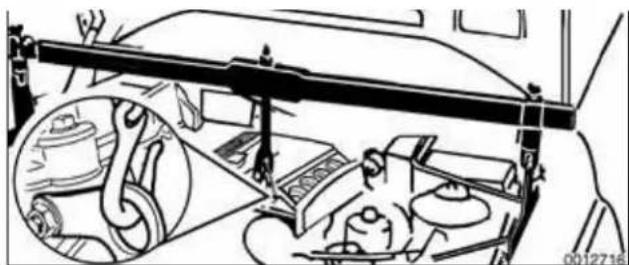 Interior view of a vehicle showing driver, dashboard, and steering wheel (no text or symbols visible)