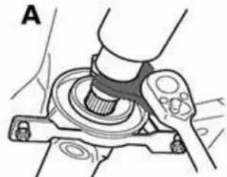 Mechanical assembly diagram showing a hand operating a bearing component (no text or labels visible)
