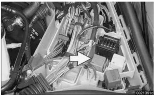 Interior view of an electronics enclosure with bundled cables and connectors (no visible text or symbols)