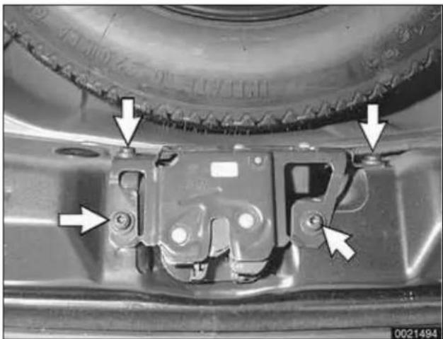 Close-up of a mechanical component with arrows pointing to features, no visible text or symbols